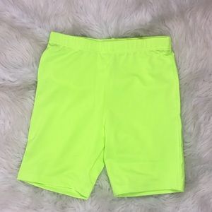 Neon green and black biker shorts